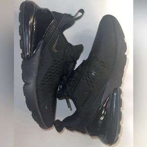 Nike Air Max 270 all black running shoes.